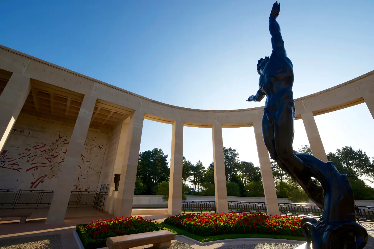 A statue in the center of the memorial at the American Cemetery at Colleville Sur Mer.