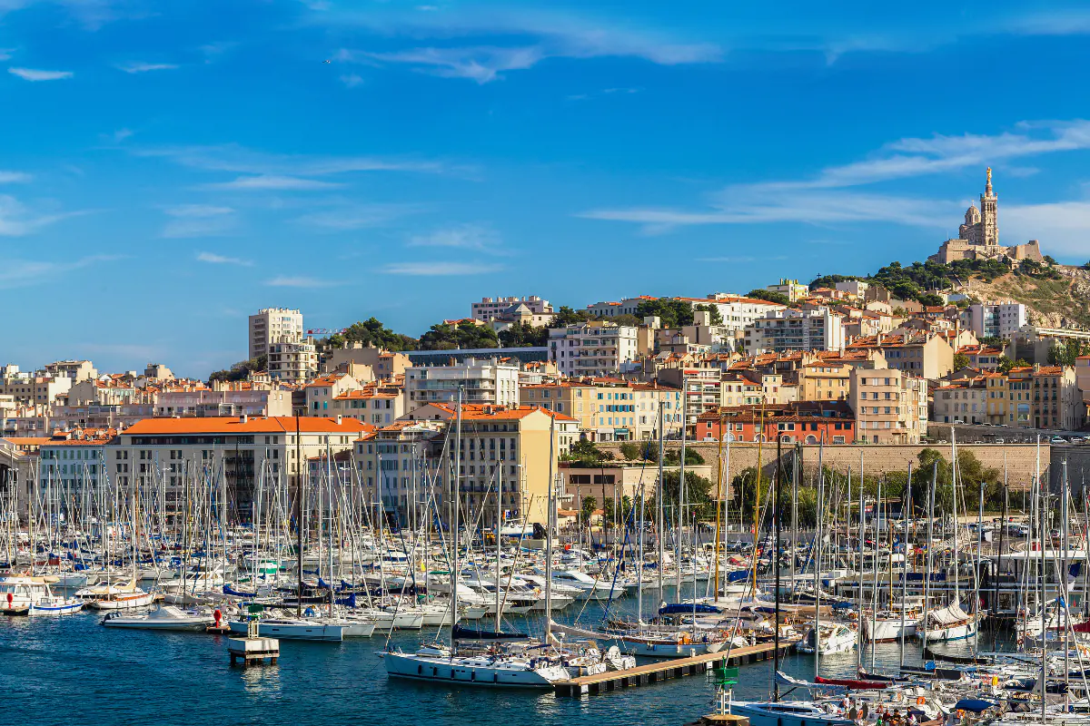 Moored boats at the old port of Marseilles on a sunny day.