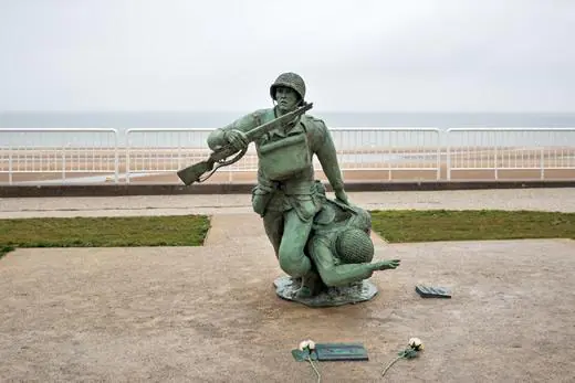 Statue of American soldiers at Omaha Beach in Vierville Sur Mer, France.