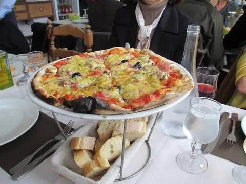 Pizza at a provencal restaurant in Provence, France.