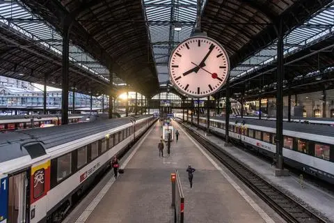 Travel to Switzerland: A classic clock at a Swiss rail station.