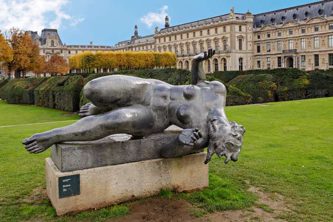 Paris Walking Tour: A statue outside of the Louvre Museum in Paris.