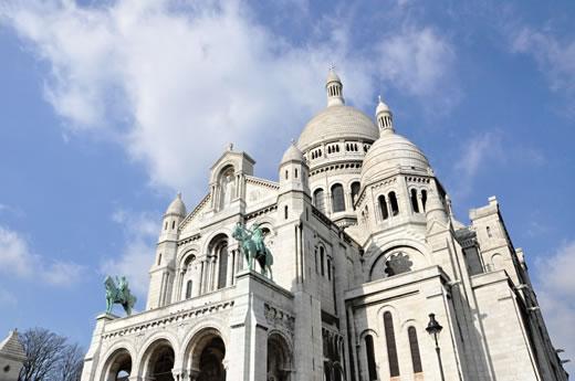 The exterior of Sacre Coeur church in Paris.