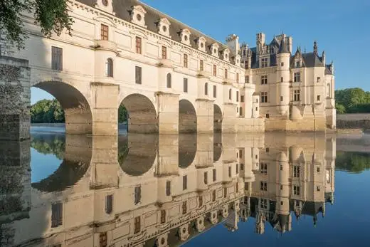 Loire Valley tour stop: Chenonceau castle with its reflection in the water.