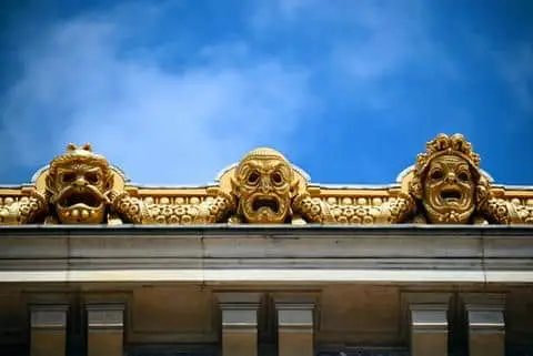Golden statues atop the Palais Garnier opera house.
