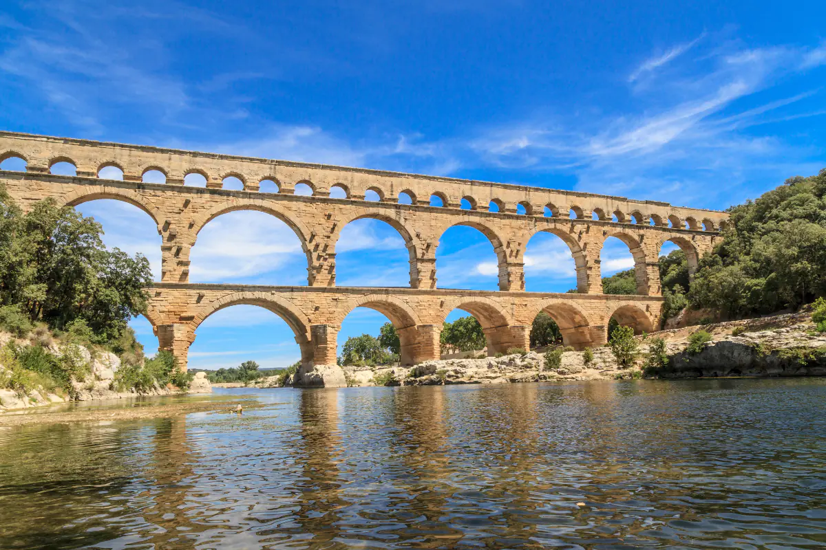 A view of the Pont du Gard in France from the river below.