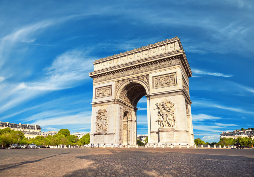 Arc de Triomphe in Paris, France, on a bright sunny day in Spring