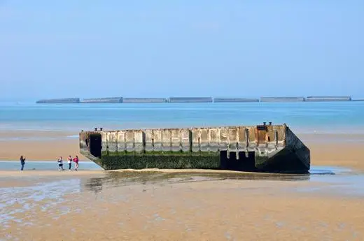 On the beach at the artificial harbor at Arromanches in Normandy, France.