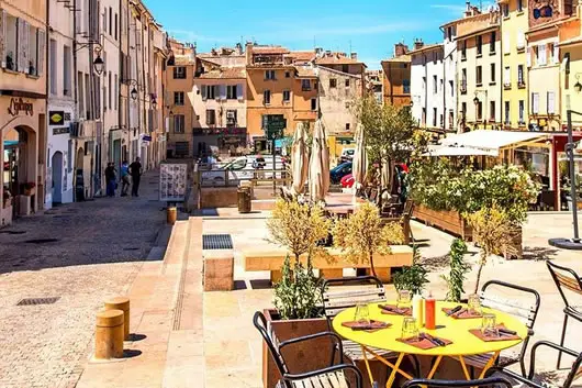 The town center of Aix-en-Provence on a sunny day.