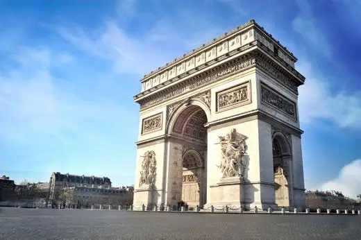 The exterior of the Arc de Triomphe in Paris.
