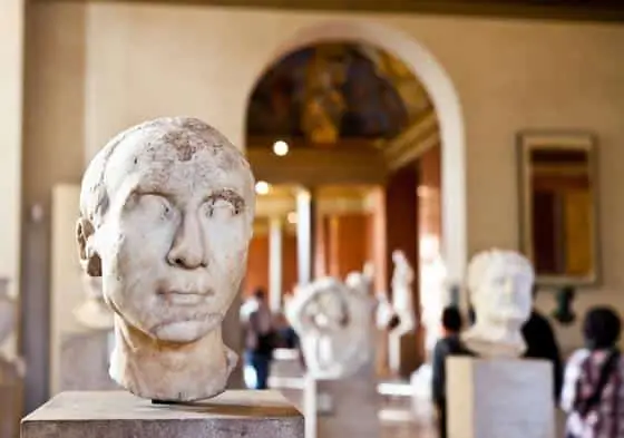 Marble statue heads in the Louvre Museum in Paris.