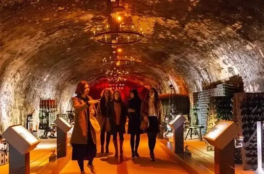 Inside the cellars during a Mumm Champagne Tour