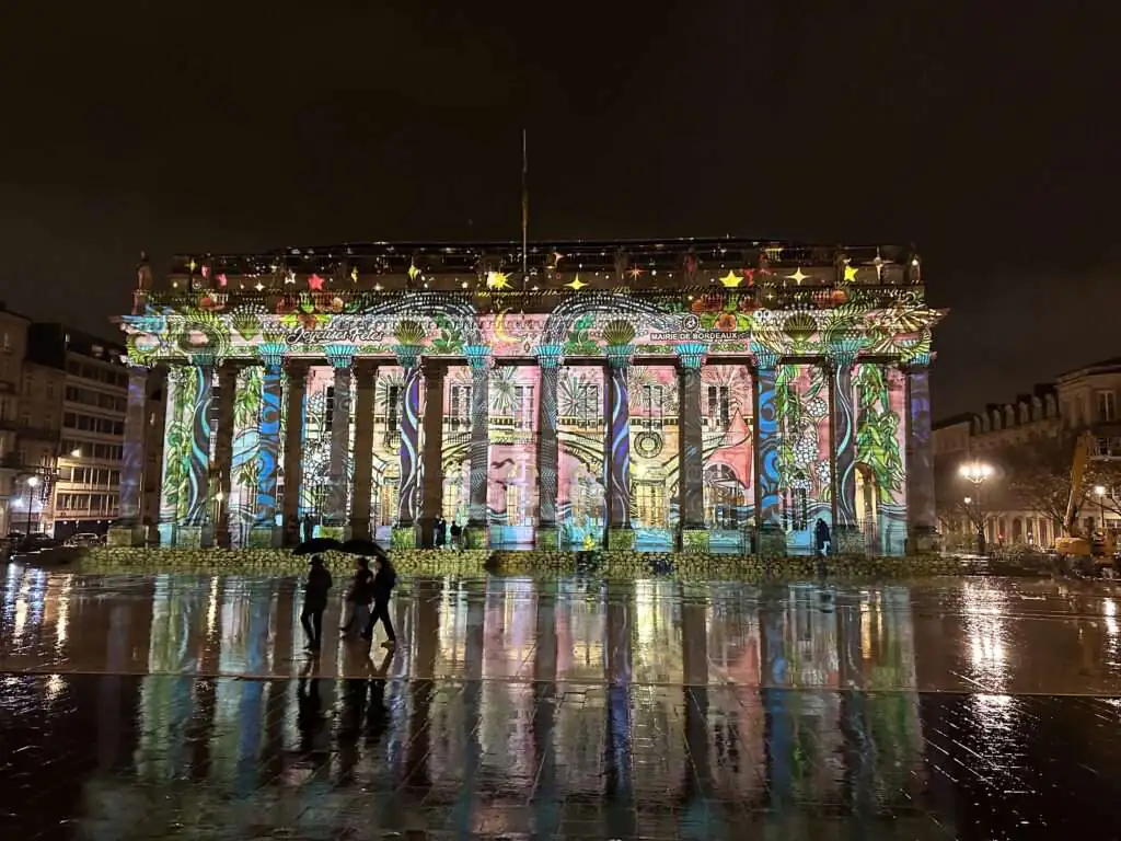 The enchanting Grand Theatre in Bordeaux on a rainy night.