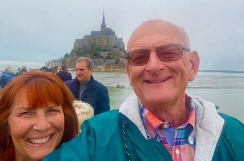 LinkParis guests posing in front of Mont Saint-Michel