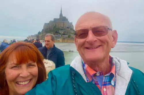 LinkParis guests posing in front of Mont Saint-Michel