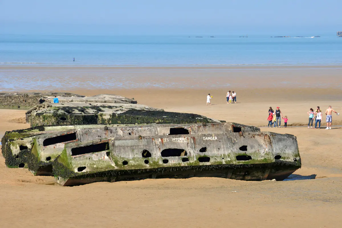 On the beach at the artificial harbor at Arromanches in Normandy, France.