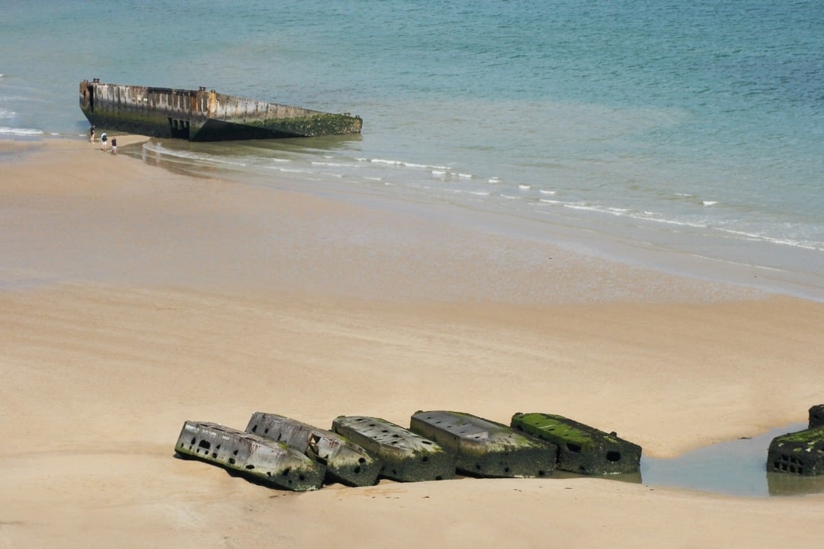 On the beach at the artificial harbor at Arromanches in Normandy, France.