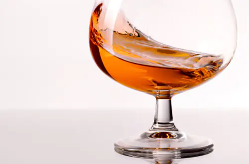 Cognac swirling in a tasting glass