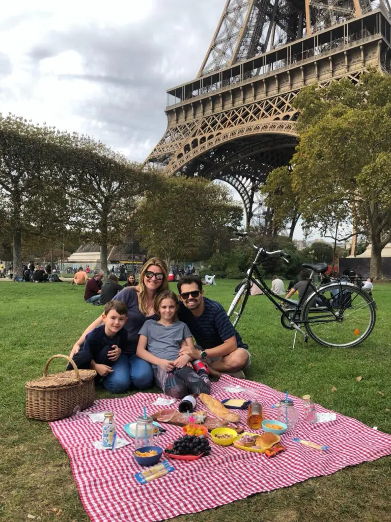 A picnic on the Champs de Mars in front of the Eiffel Tower