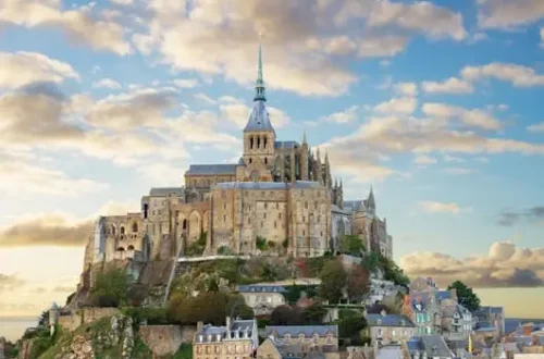 Mont Saint-Michel abbey rising from the tidal flats in Normandy