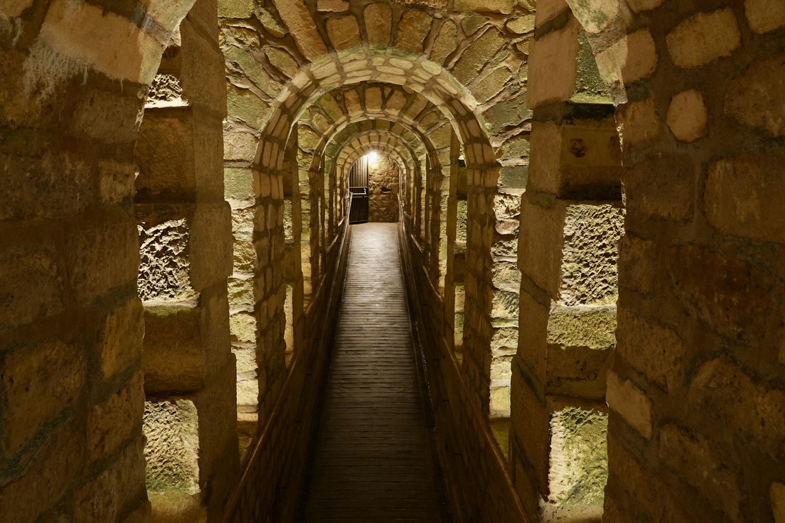 A stone gallery in the Paris Catacombs