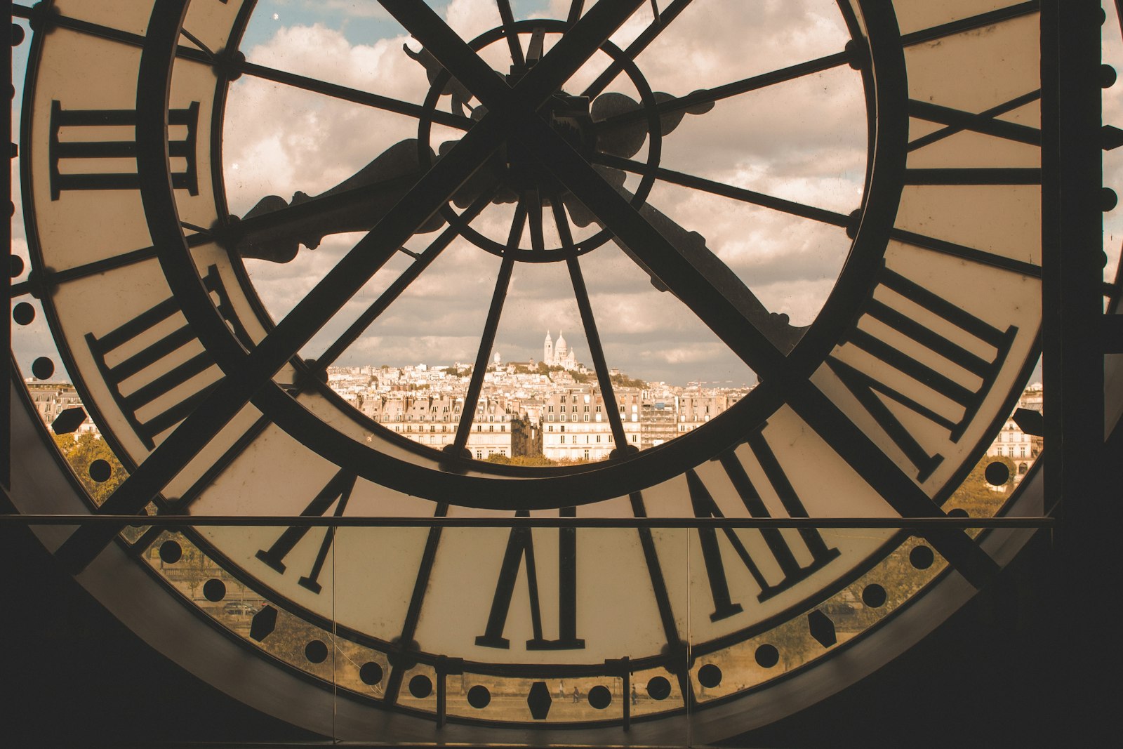 Montmartre and the Sacré-Cœur seen through the great clock of the Musée d'Orsay