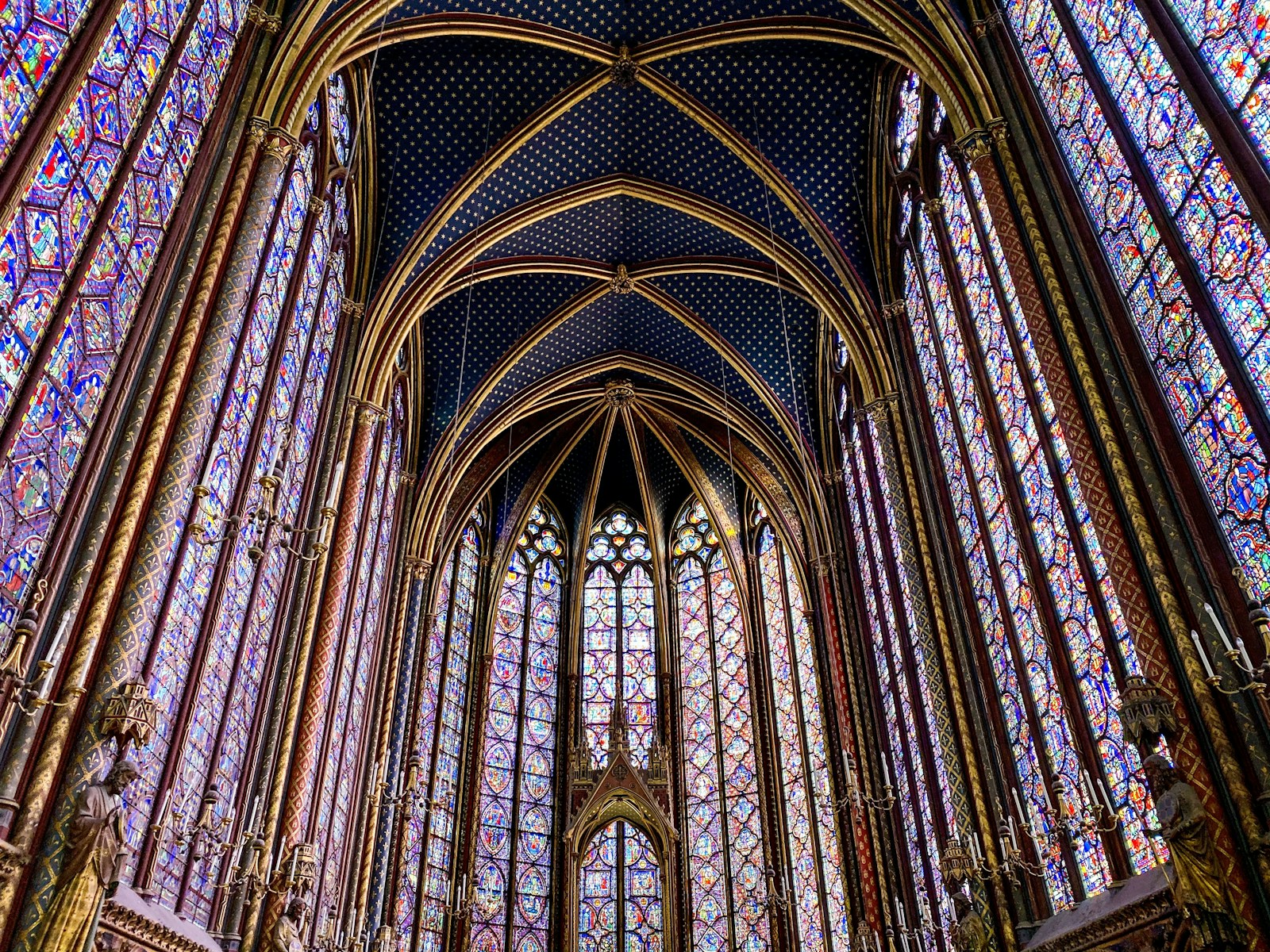 The upper chapel of Sainte-Chapelle, its stained glass lit from outside