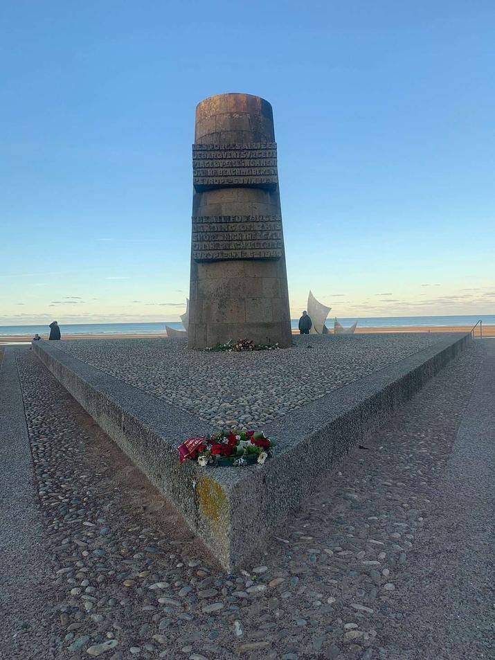 Flowers placed by a local at Omaha Beach