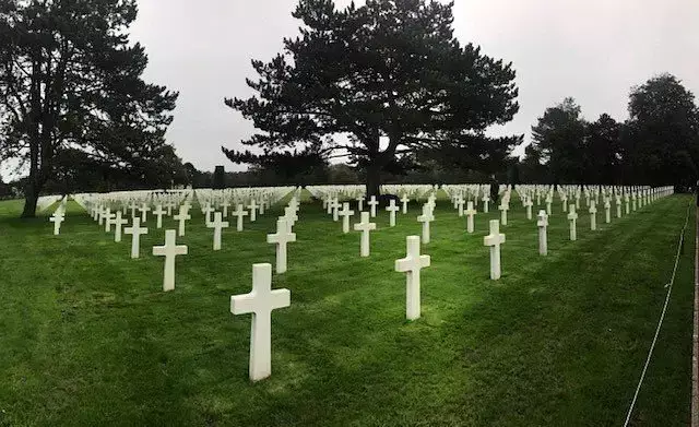 Just a few of the over 9,000 graves at Colleville-sur-Mer